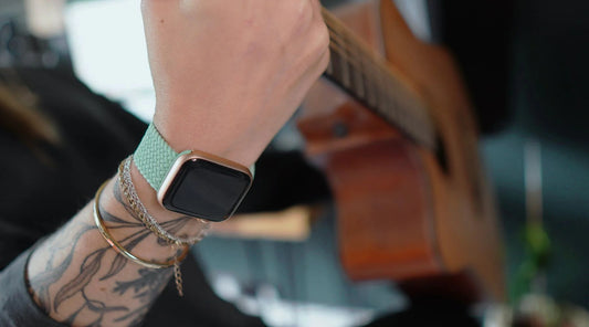 Musician wearing braided elastic nylon Apple Watch Strap in Pistachio from The Thrifty Gentleman