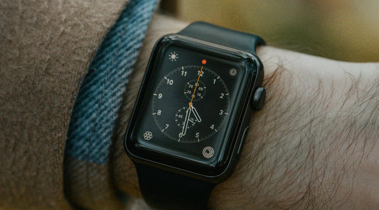 Smartly dressed man wearing Apple Watch with Black Silicone Apple Watch Band